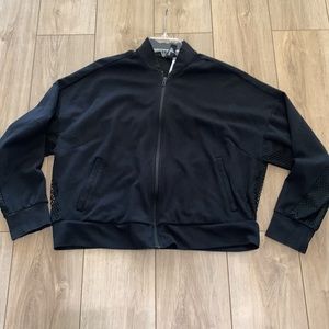 Adidas Women’s zip up light weight jacket. GUC